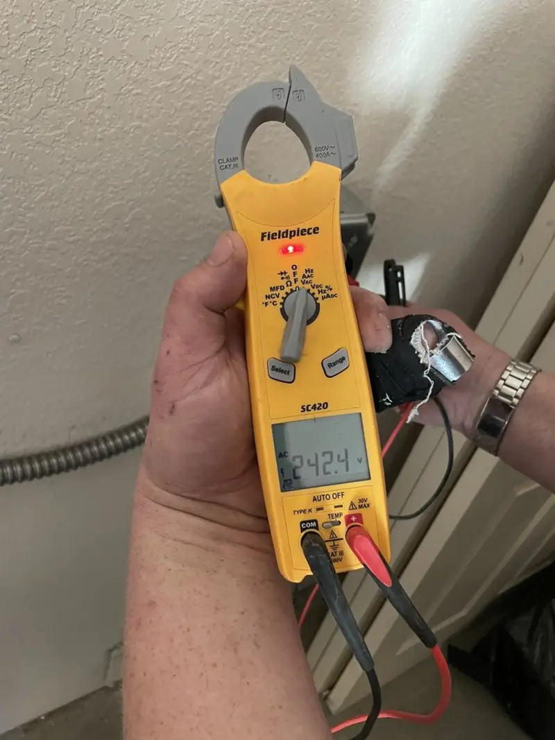 Voltage testing with clamp meter during Hot Tub / Pool Electrical Wiring in Shiloh